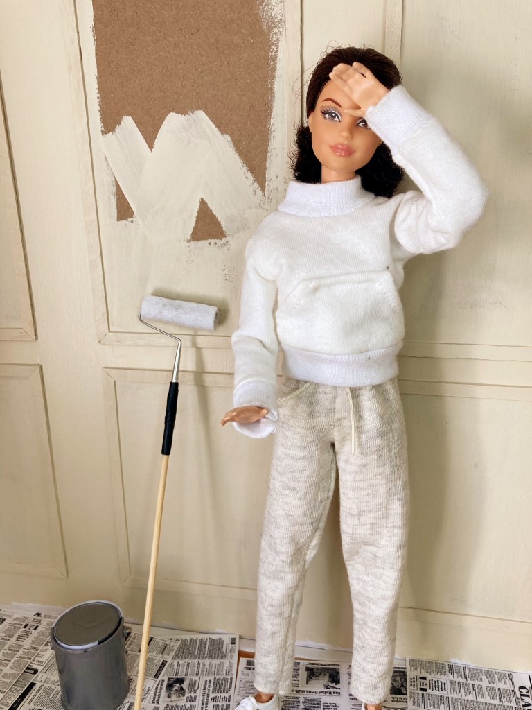 Mini Rie exhausted from painting the kidkraft dollhouse